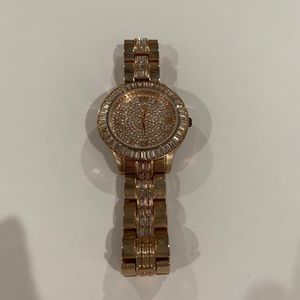 Rhinestone gold tone watch. Needs battery.